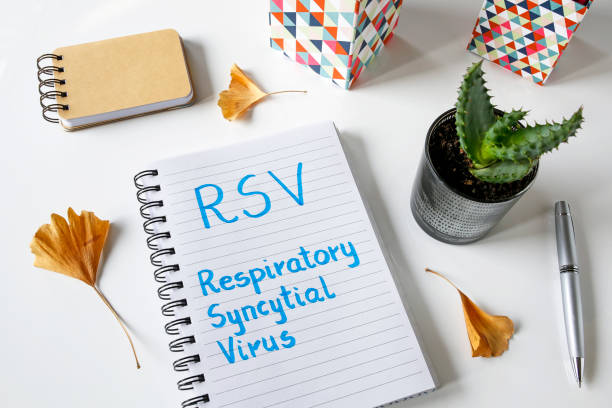 RSV Respiratory Syncytial Virus written in a notebook stock photo