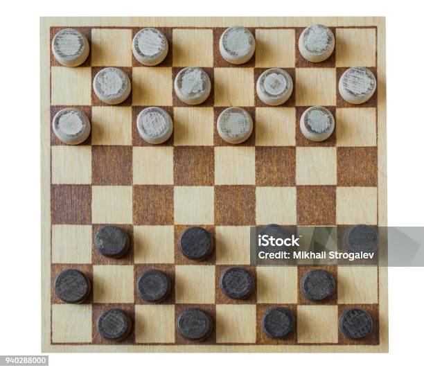 Wooden Checkerboard With Checkers Spaced On Table Isolated On A White Background Stock Photo - Download Image Now