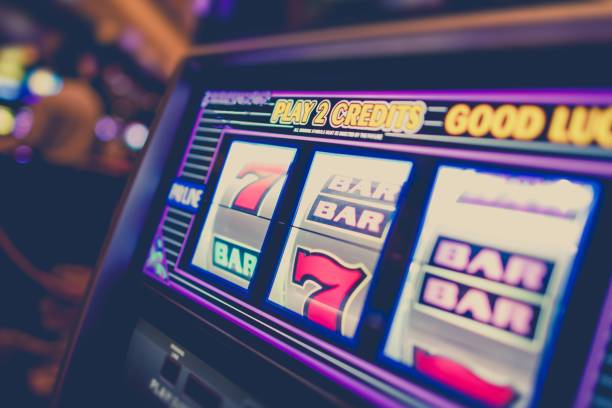 istock Casino Slot Machine Closeup 940288056