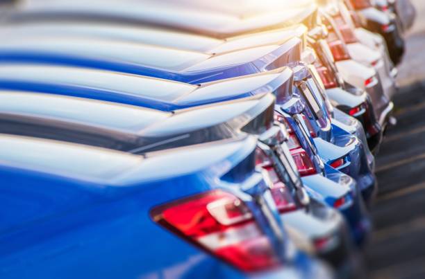 Line of Brand New Cars Line of Brand New Cars. Vehicles Production Line. Automotive Factory Theme. car finance stock pictures, royalty-free photos & images