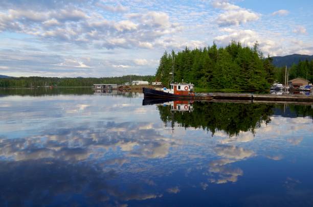 istock Evening clouds and deep blue sky reflected in the bay, Shearwater, BC 940300004