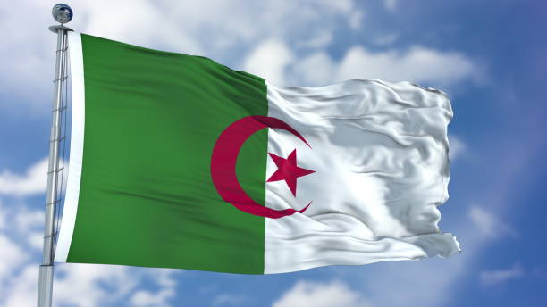 istock Algeria Flag in a Blue Sky 940317904