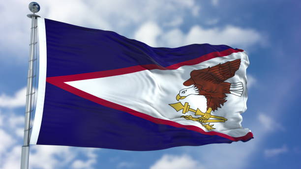 istock American Samoa Flag in a Blue Sky 940317932