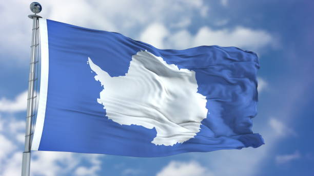 istock Antarctica Flag in a Blue Sky 940317980
