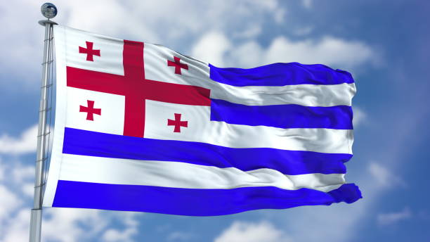 istock Barbados Flag in a Blue Sky 940318138