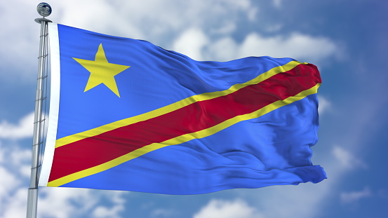 Congo Democratic Republic of the Flag in a Blue Sky. Use this clip loud and proud to express loyalty and love to our country. It is a seamless loop with luma channel.