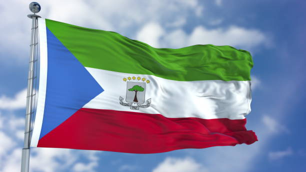 Equatorial Guinea Flag in a Blue Sky. Use this clip loud and proud to express loyalty and love to our country. It is a seamless loop with luma channel.