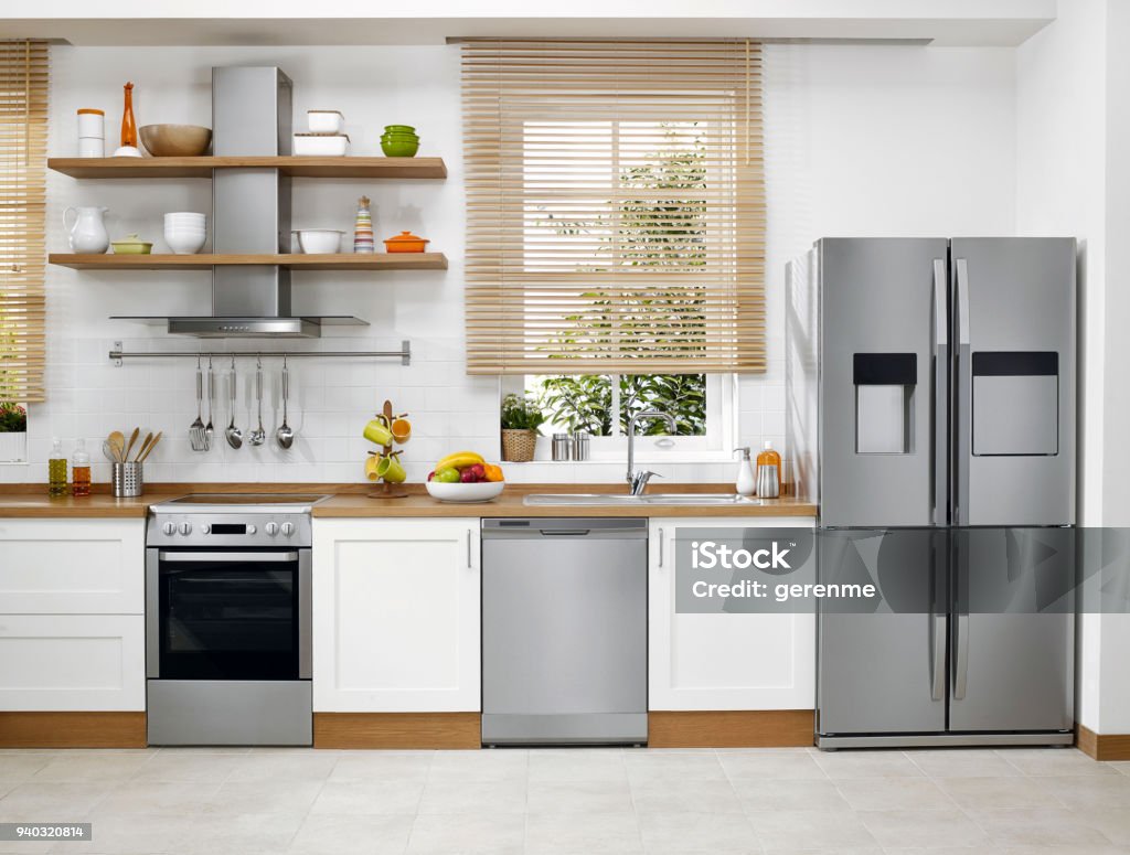 Domestic kitchen Wide angle shot of a Domestic kitchen with modern appliances Kitchen Stock Photo