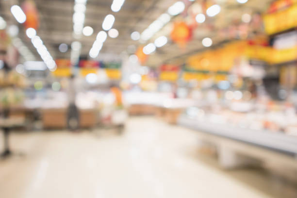 istock Abstract supermarket grocery store blurred defocused background with bokeh light 940320842