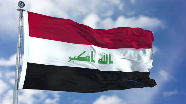 istock Iraq Flag in a Blue Sky 940321762