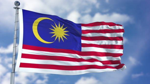 istock Malaysia Flag in a Blue Sky 940324586