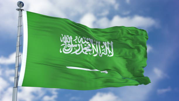 istock Saudi Arabia Flag in a Blue Sky 940327038