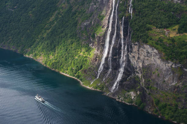 istock Summer landscape with fjord and waterfall, Norway 940327152