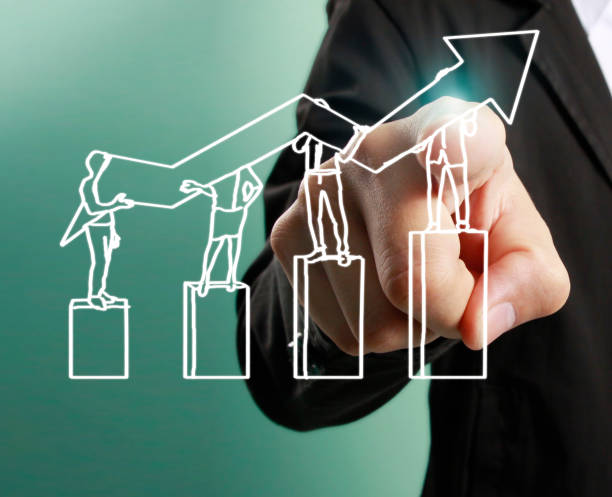 istock financial symbols coming from hand 940327248