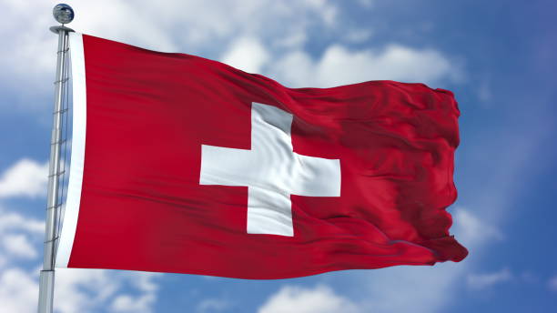 istock Switzerland Flag in a Blue Sky 940327294