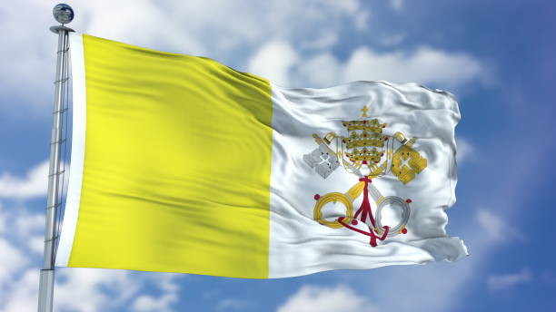 istock Vatican City Flag in a Blue Sky 940329680