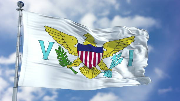 istock Virgin Islands US Flag in a Blue Sky 940329714