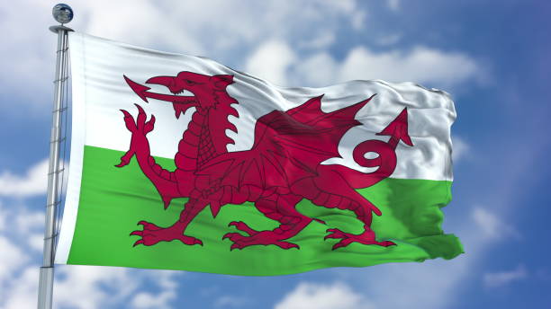 istock Wales Flag in a Blue Sky 940329728