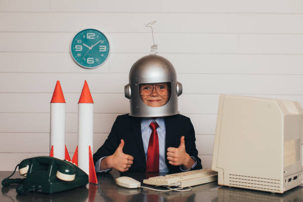 istock Young Business Boy with Space Helmet and Rockets 940334466