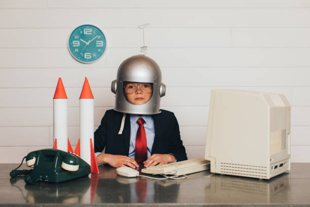 istock Young Business Boy with Space Helmet and Rockets 940334468