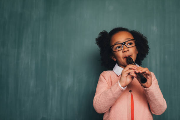 istock Young Retro Nerd Girl Playing Recorder 940334758