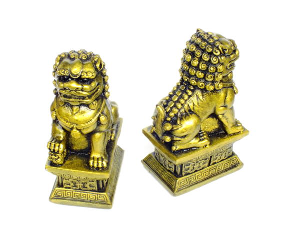 istock chinese imperial lion statue isolated on white background 940352510