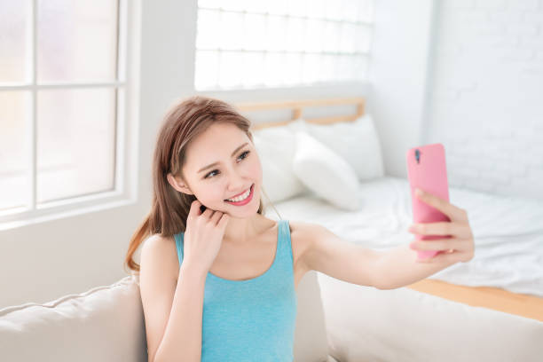istock woman selfie happily 940355740