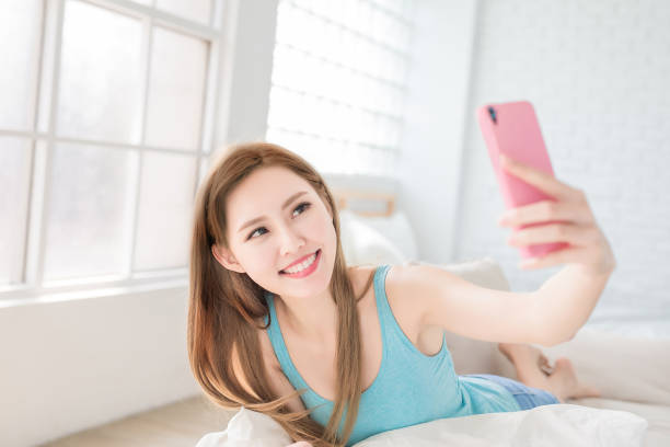 istock woman selfie happily 940355776