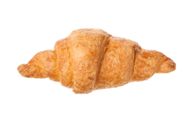 istock Fresh tasty one croissant isolated on white background 940369094