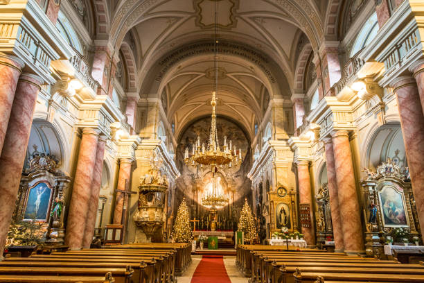 istock Ornate interior architecture of a Romanian Romani Catholic church 940372528