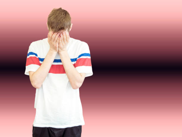 istock young man facepalm hands to the face isolated 940373608