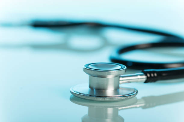 istock Phonendoscope-medical diagnostic tool, close-up on gray 940382536