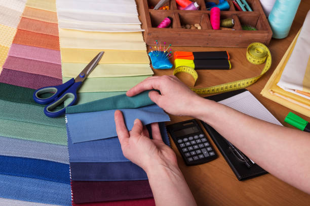 istock Samples of fabrics, sewing accessories, design of clothing 940385268