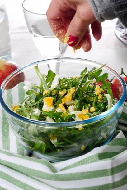 istock delicious dandelion salad in a glass bowl 940385870
