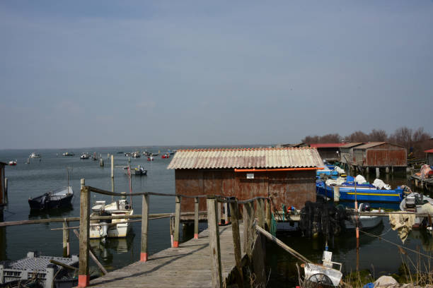 istock fishing houses on the Po Delta 940390754