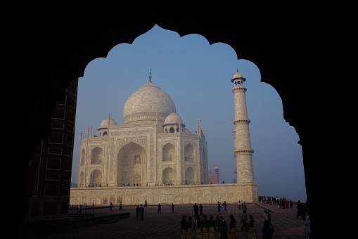 People visiting the magnificent Taj Mahal in Agra, India