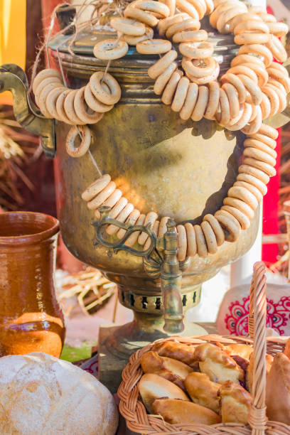 istock Traditional russian ceremony - tea, samovar, bagels and small pies 940399566