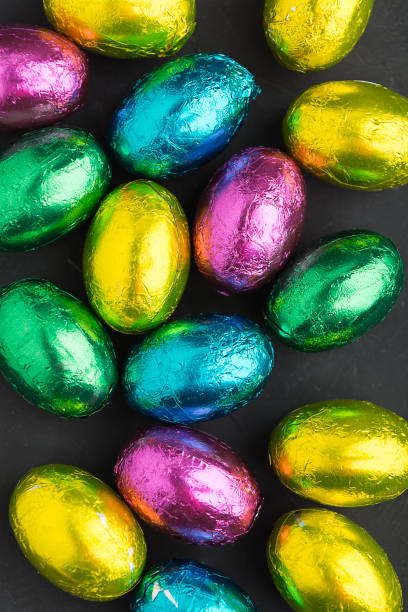istock Colorful sweet eggs in niggly wiggly texture background 940403124