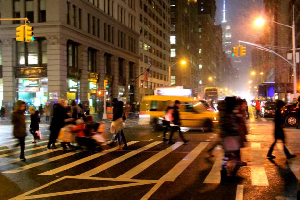 istock Blurry Pedestrians Crossing 5th Avenue 940404194