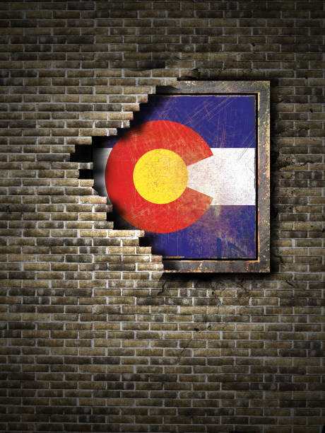istock Old Colorado flag in brick wall 940405278