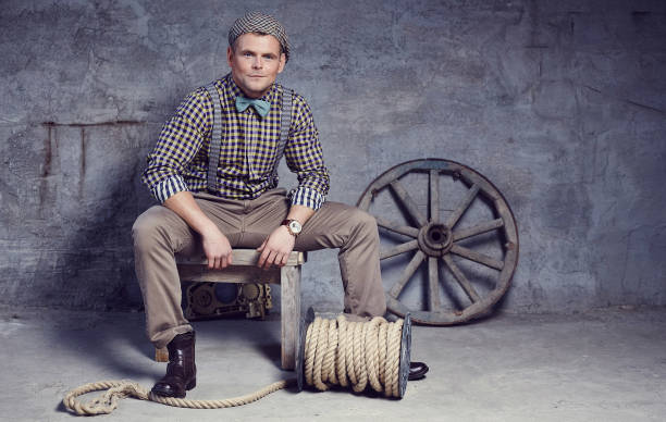 istock Full body portrait of a guy in a bow tie. 940410894