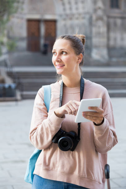 istock traveling  girl searching for the direction 940415148