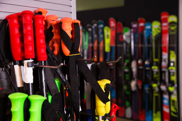 istock Ski poles for sale in modern store 940424122
