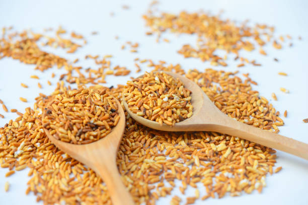 istock Ground roasted rice Thai condiment on white background 940426800
