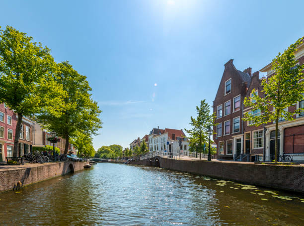 istock Leiden with his canals in early morning sun. 940432774