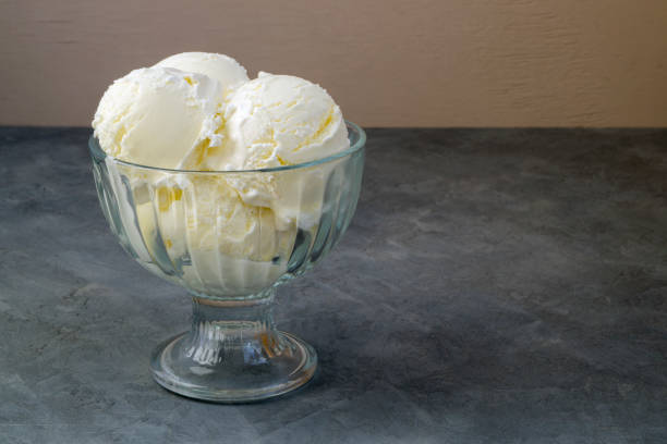 istock Ice cream balls in a glass vase. 940432830