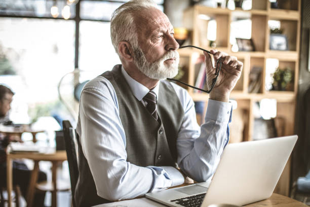 istock Serious senior businessman at his office. Portrait. 940433172