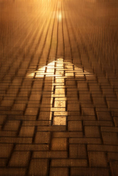istock Arrow on the road background. Forward moving concept with arrow at the sunset 940437334