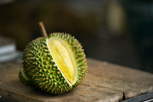 yellow Durian on table stock photo