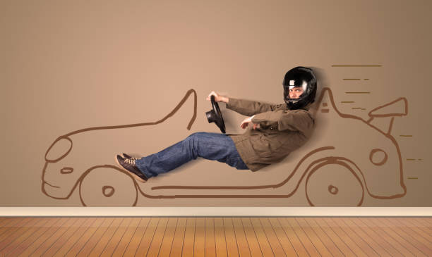 istock Happy man driving an hand drawn car on the wall 940441446